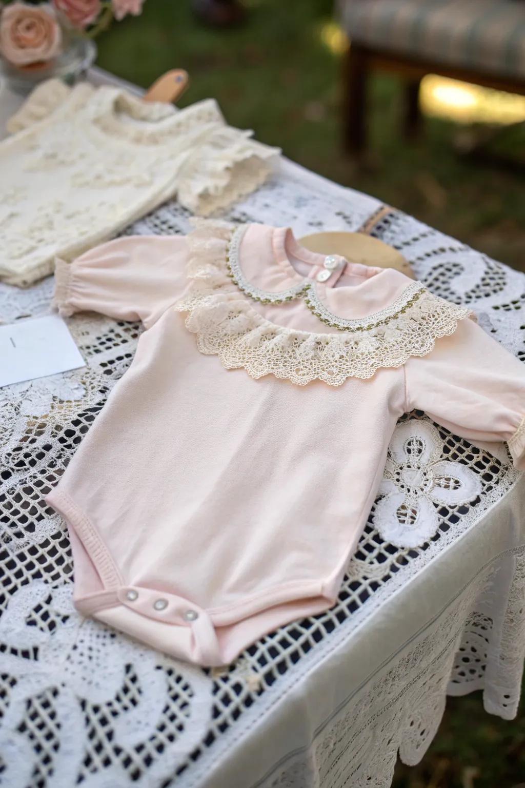 An elegant onesie showcasing vintage lace details.