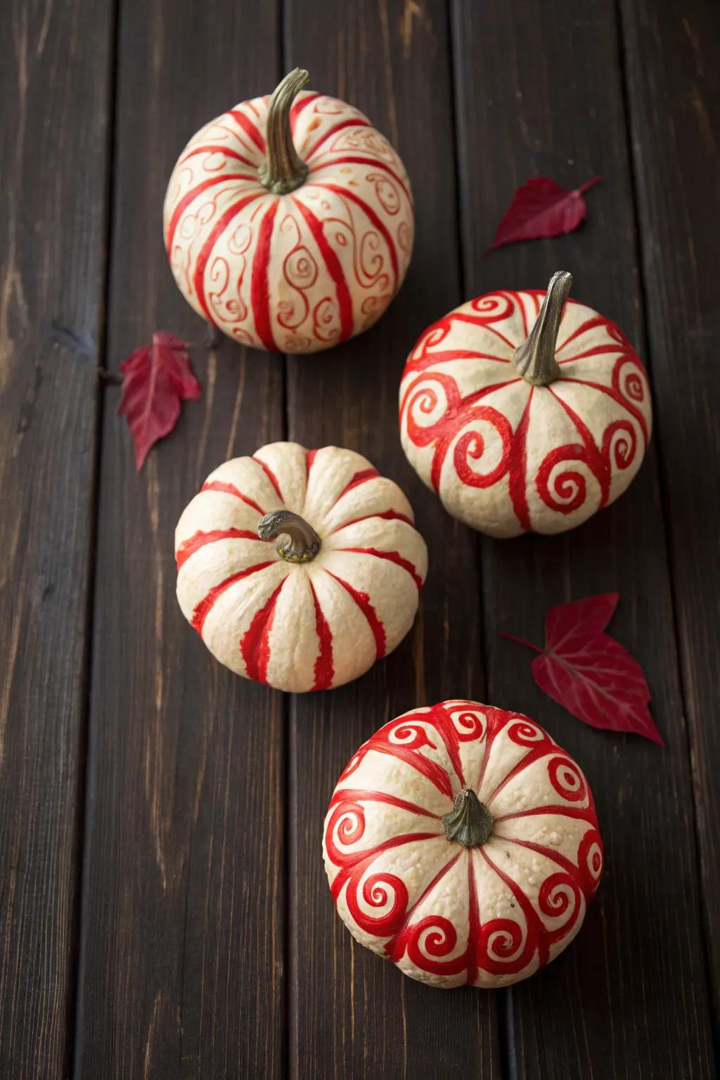 Pumpkins featuring crimson swirls create a daring, sensational announcement.