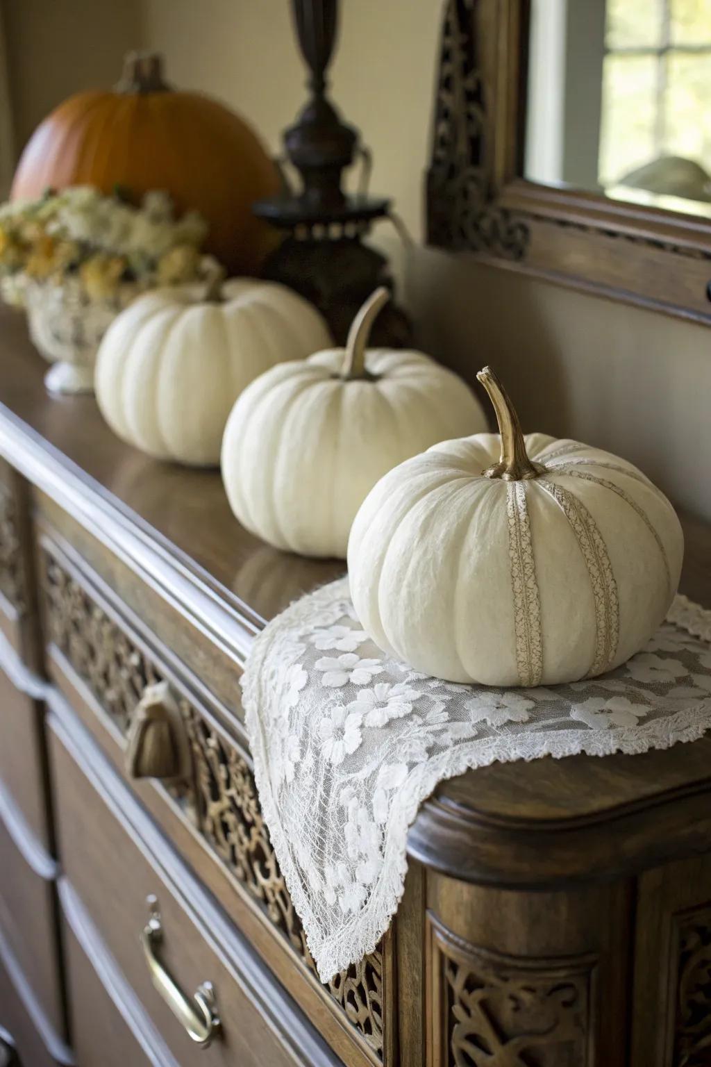 Lace-covered pumpkins for a vintage touch.