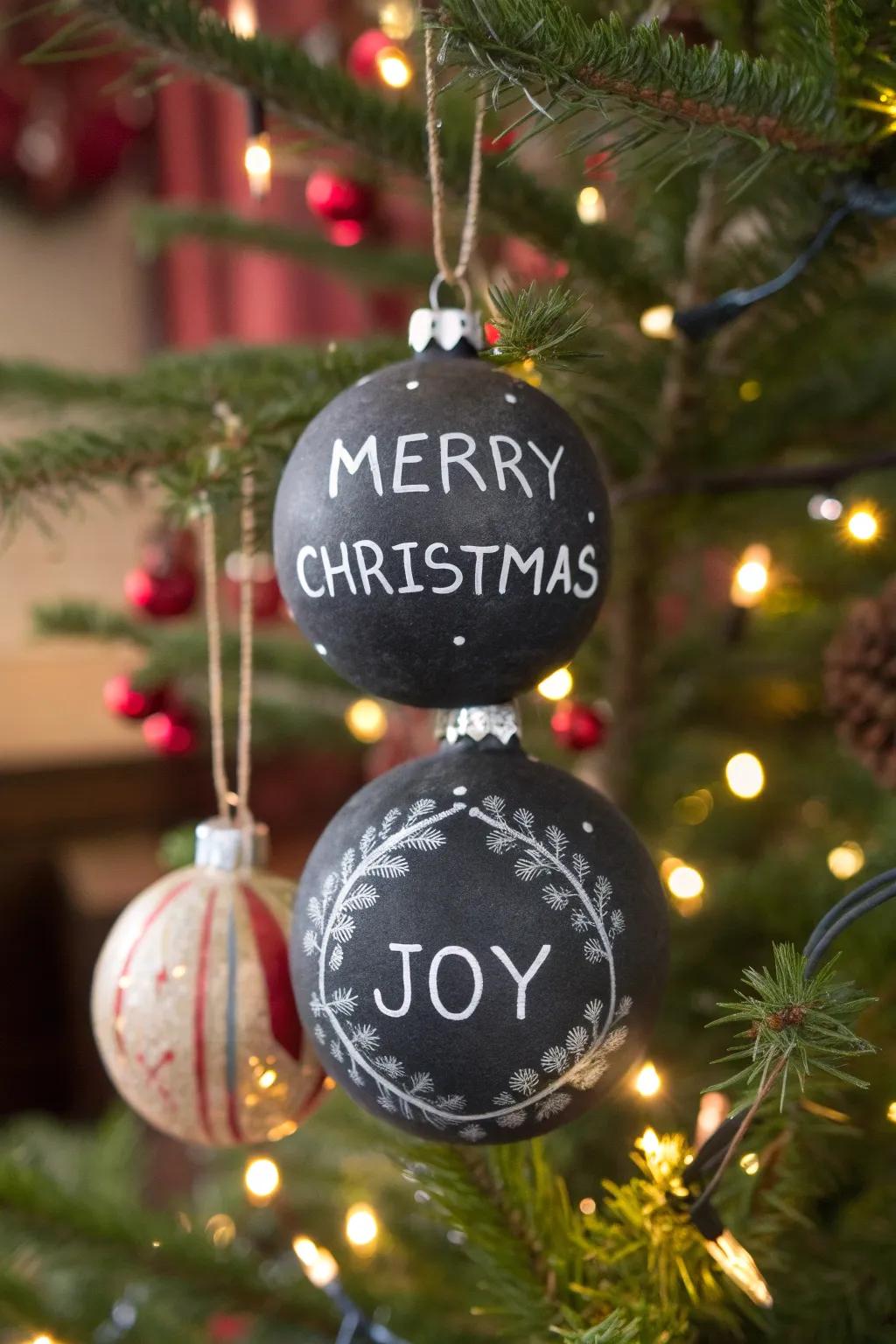 Slateboard-painted ornaments invite festive creativity and messages.