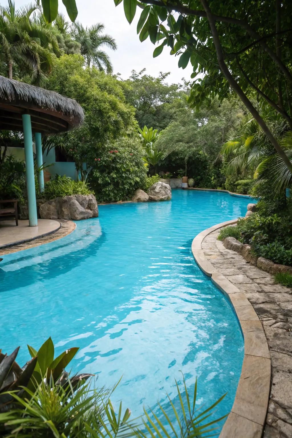 Vibrant plaster finishes highlight the tropical appeal of lagoon pools.