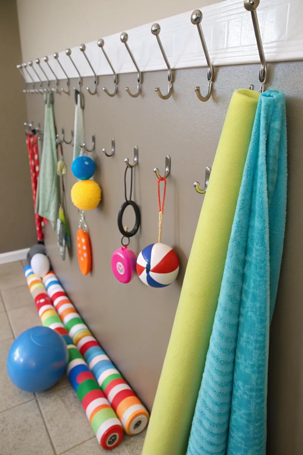 Affixing hooks provide pliable and interim pool float reservation.
