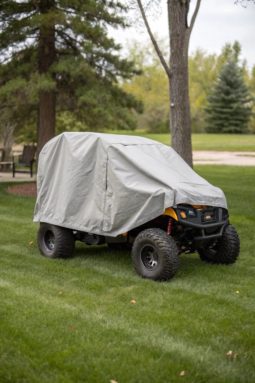 Custom-fit covers protecting outdoor-stored ride-on toys.