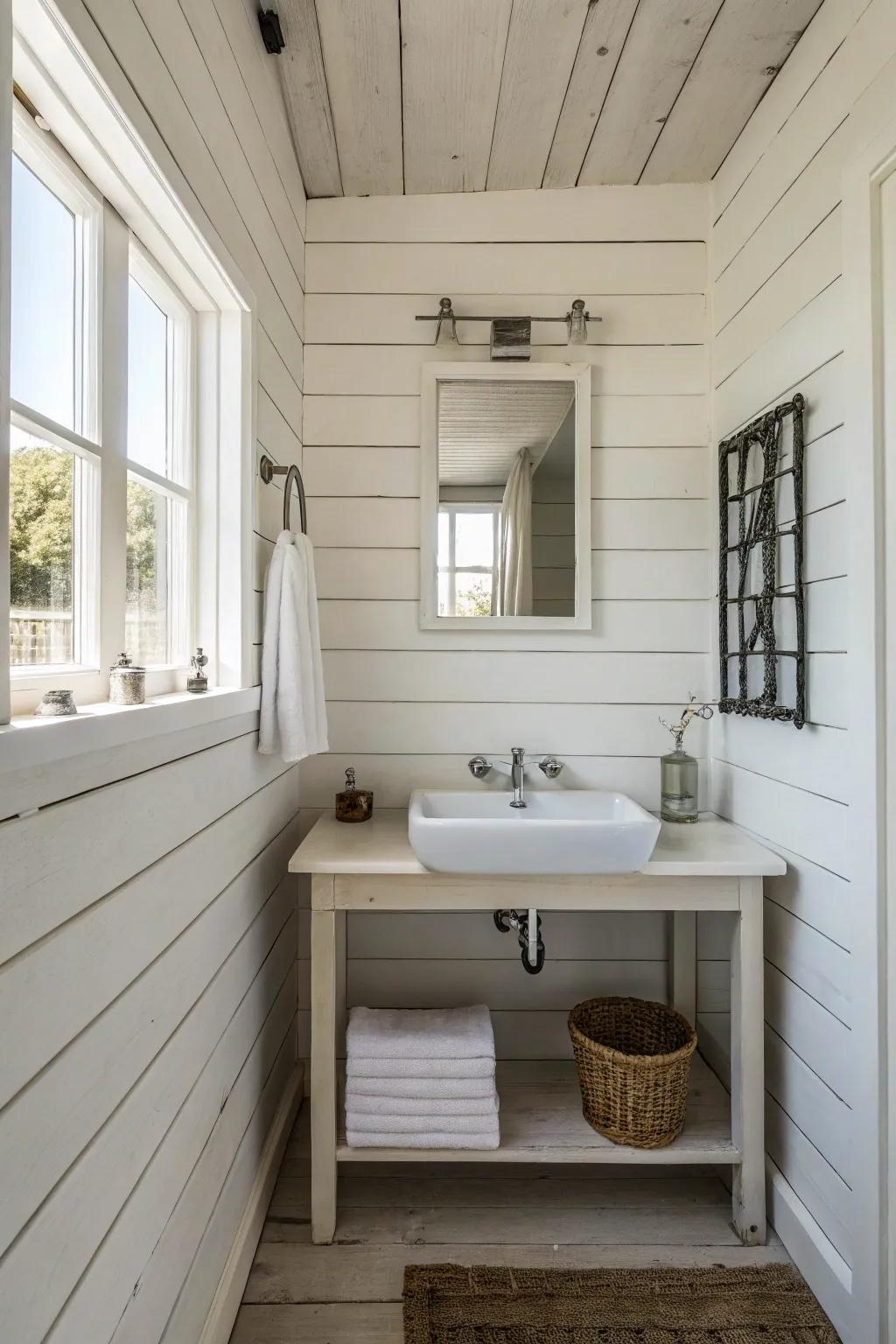 A minimalist bathroom featuring white wall planks for a serene look.