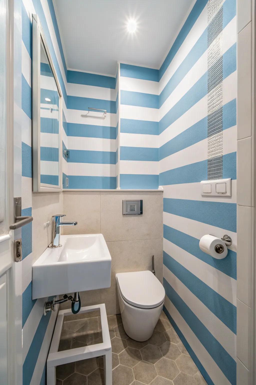 Blue and pure white lines introduce a nautical theme while enhancing the space's height.