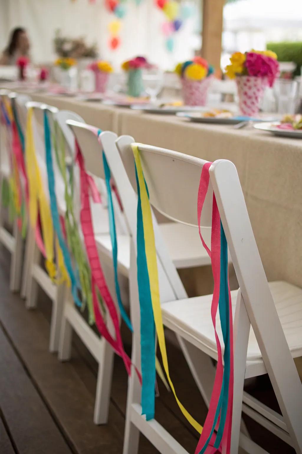 Enhance chairs with colorful streamer aesthetic.