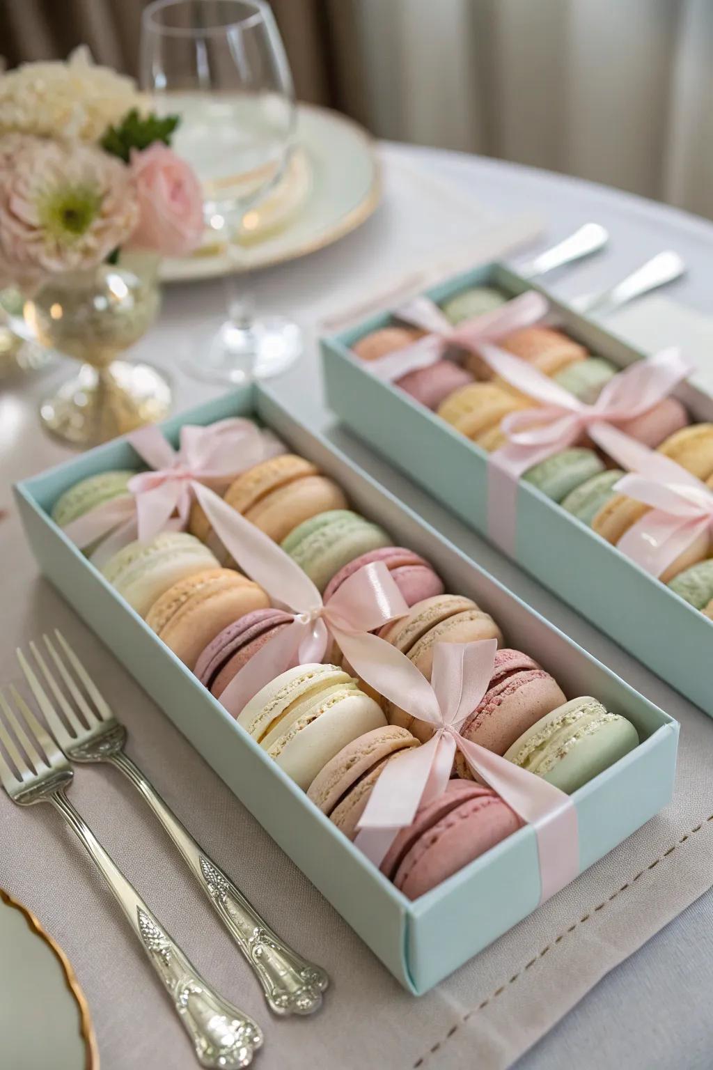 Stylish boxed macarons with ribbons.