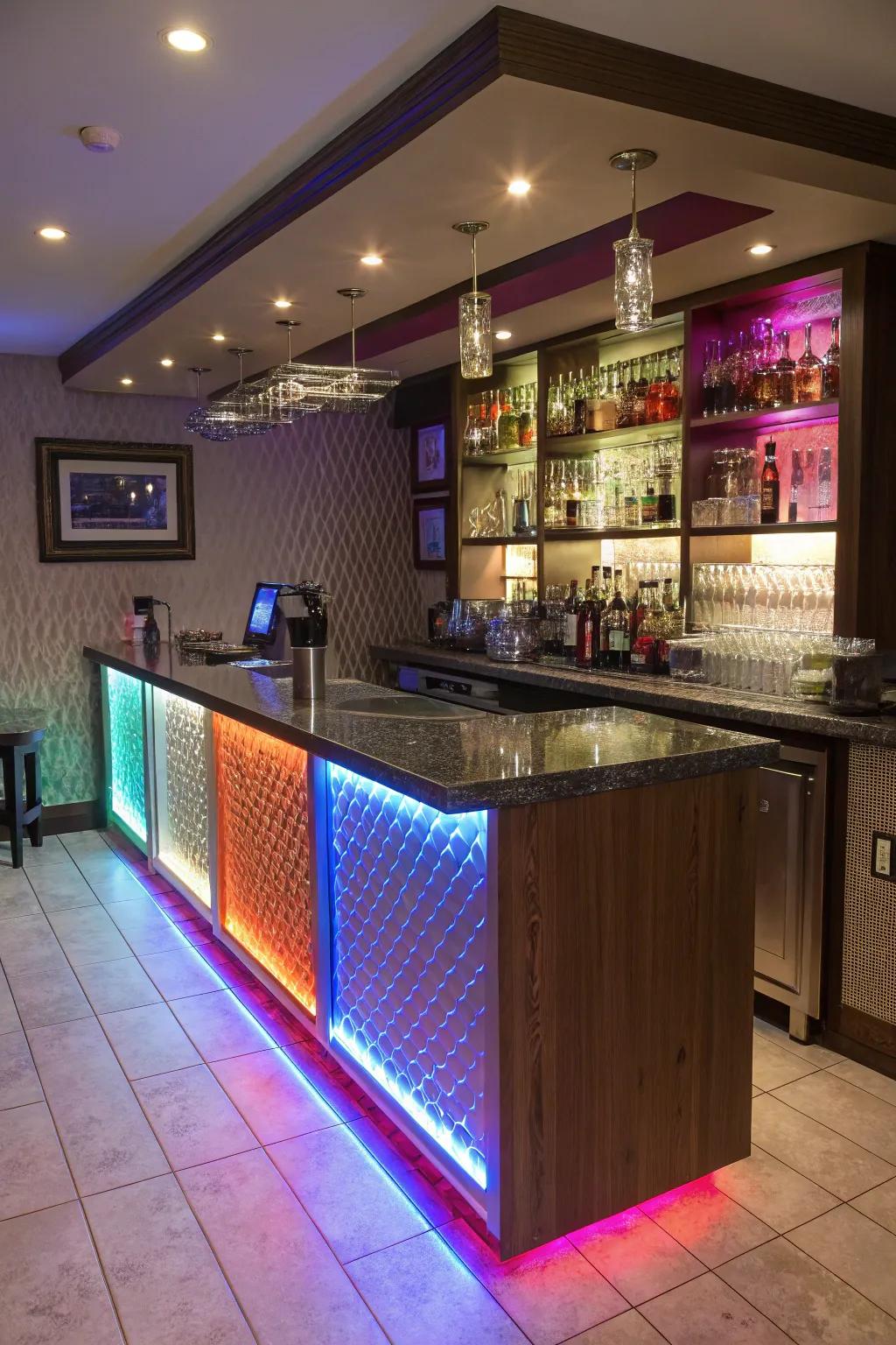 Dramatic LED lighting is used to enhance a compact wet bar.
