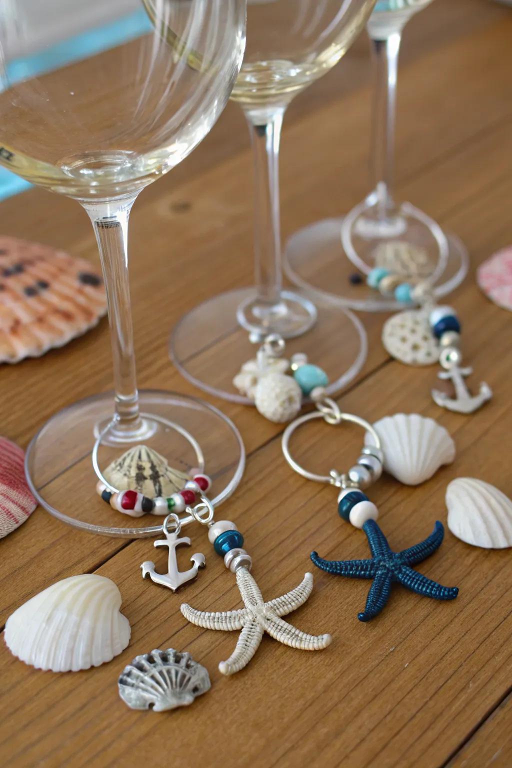 Incorporate a touch of ocean charm to your gatherings with coastal wine glass trinkets.