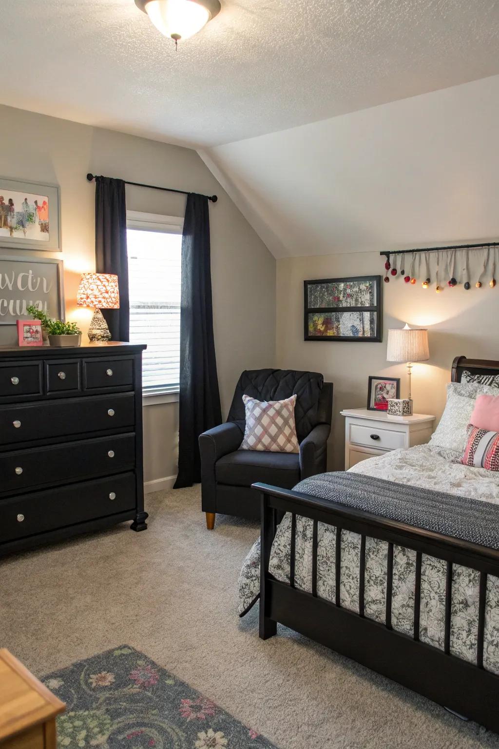 A cozy corner offers a personal retreat within a bedroom enhanced by bold dark furniture.