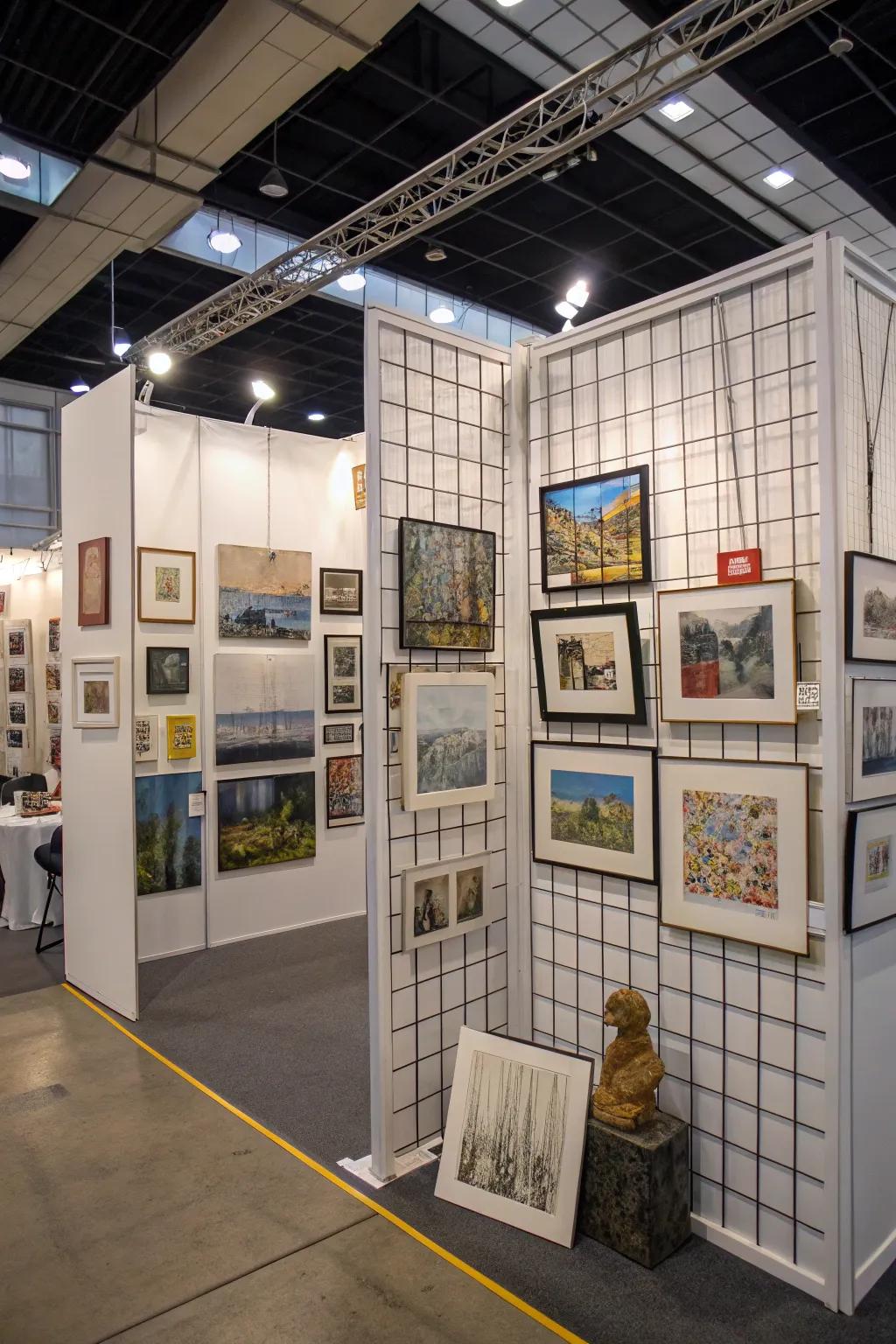 Grid walls in an art exhibit provide for an effective and appealing vertical display of artworks.