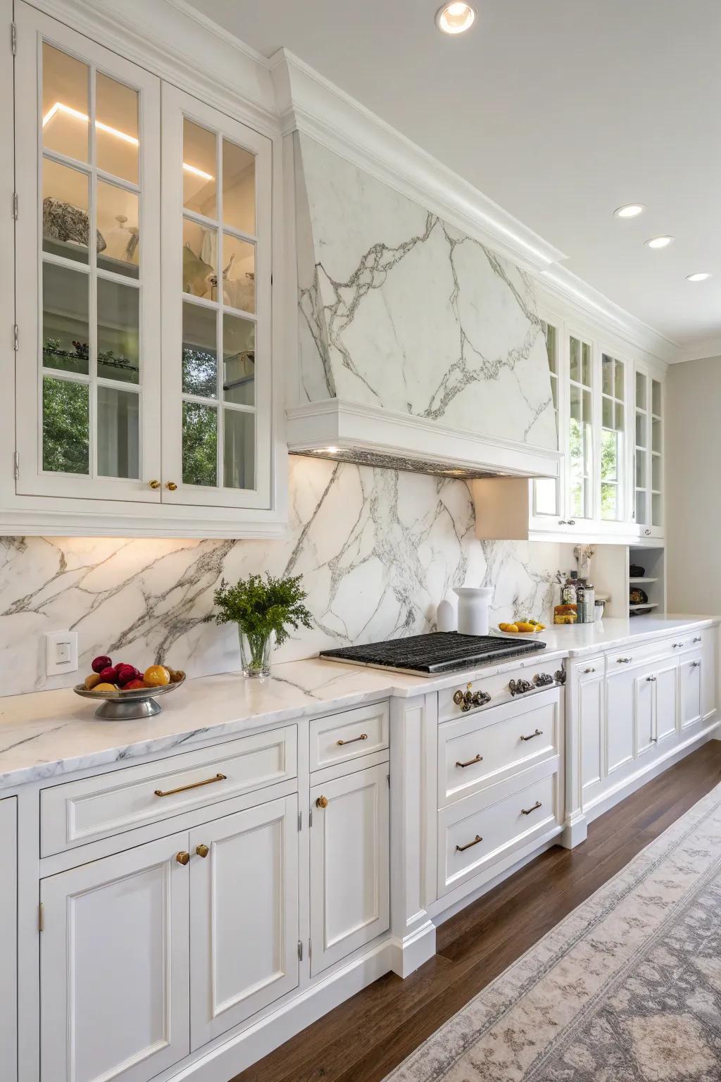 Stone backsplashes evoke an atmosphere of sophistication within this white kitchen.
