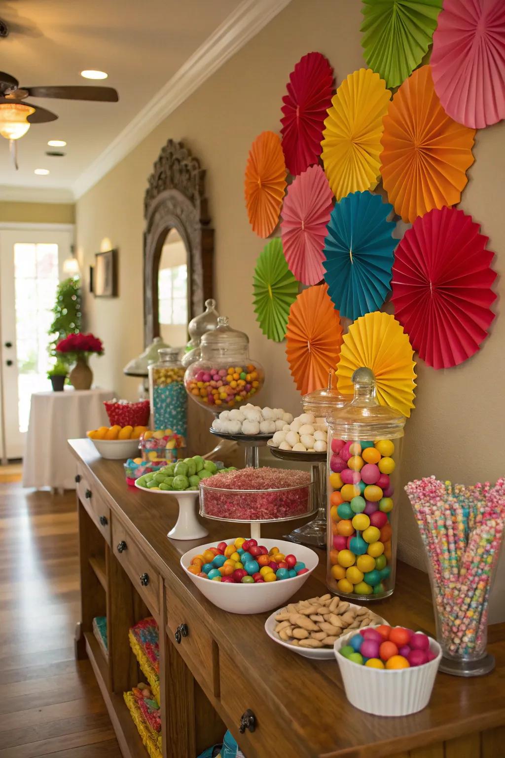 A vibrant DIY backdrop greatly improves the look of your candy buffet.