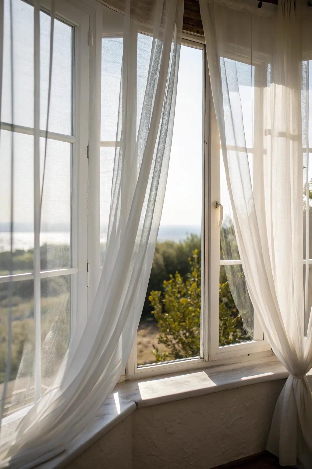 Lightweight curtains imparting an ethereal quality to corner windows.