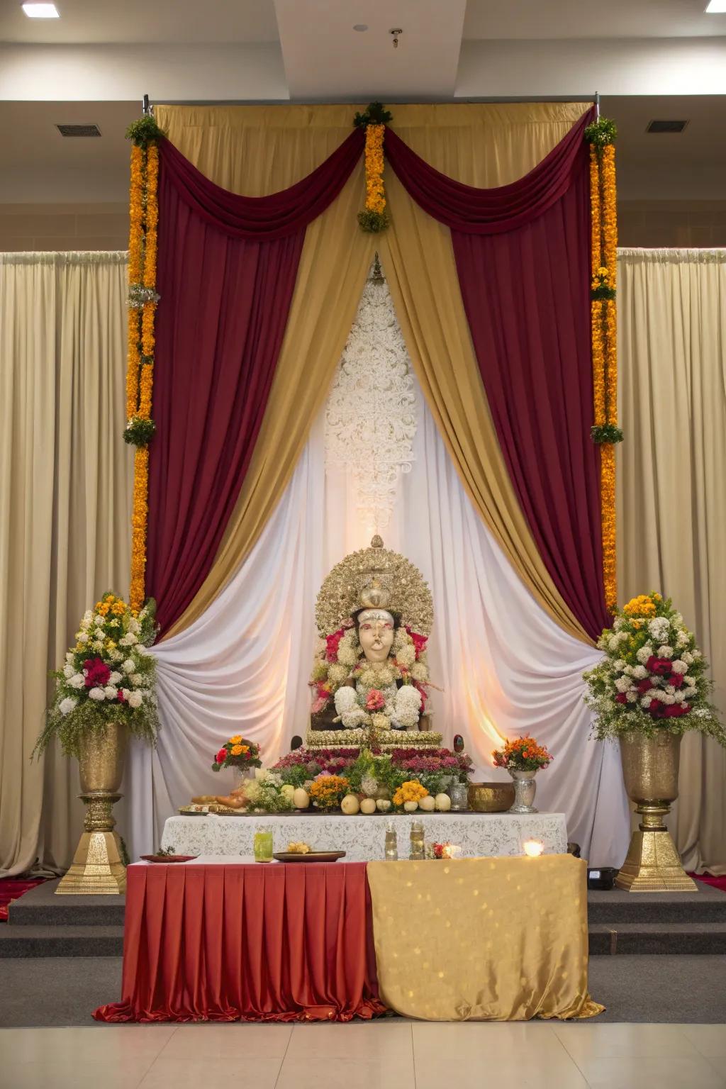 Drapes enriching the Ganpati setting with a majestic feel.