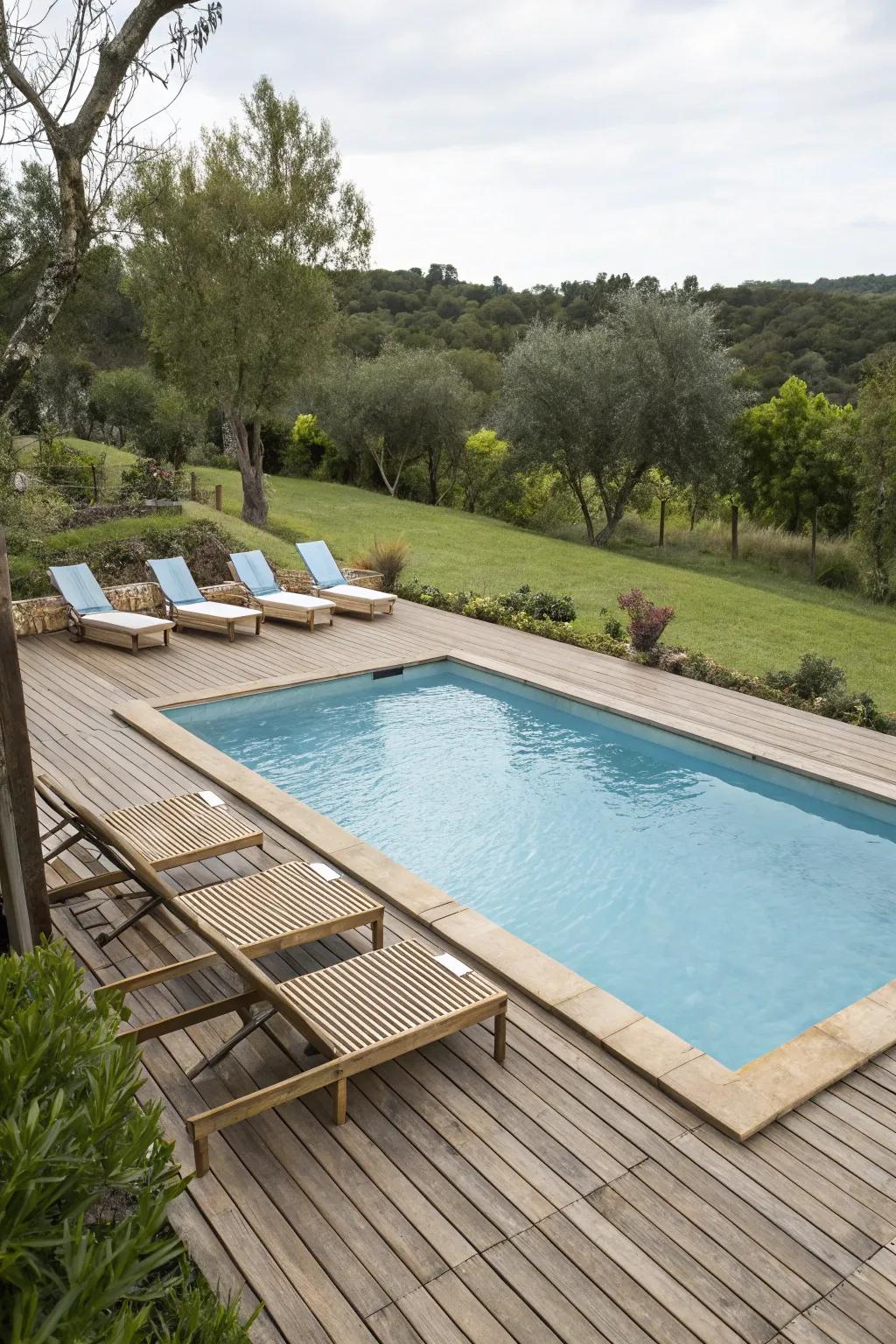 Timber decking brings warmth and a natural ambiance to the poolside.