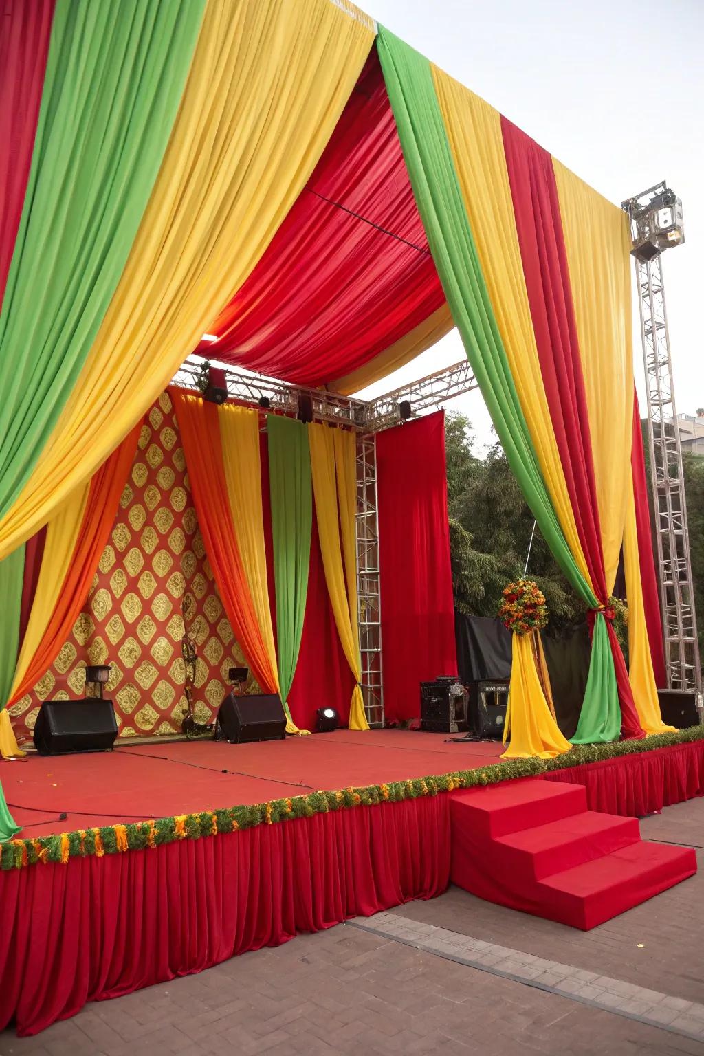 A dynamic backdrop featuring brightly colored fabric drapes.