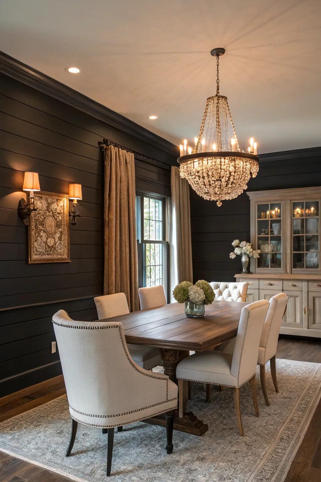 A dining area featuring striking dark shiplap walls and contrasting light furnishings.
