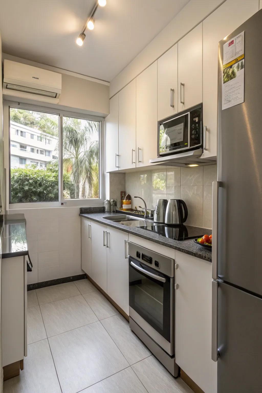 Space-saving appliances integrate flawlessly into a compact kitchen, ensuring no compromise on functionality.