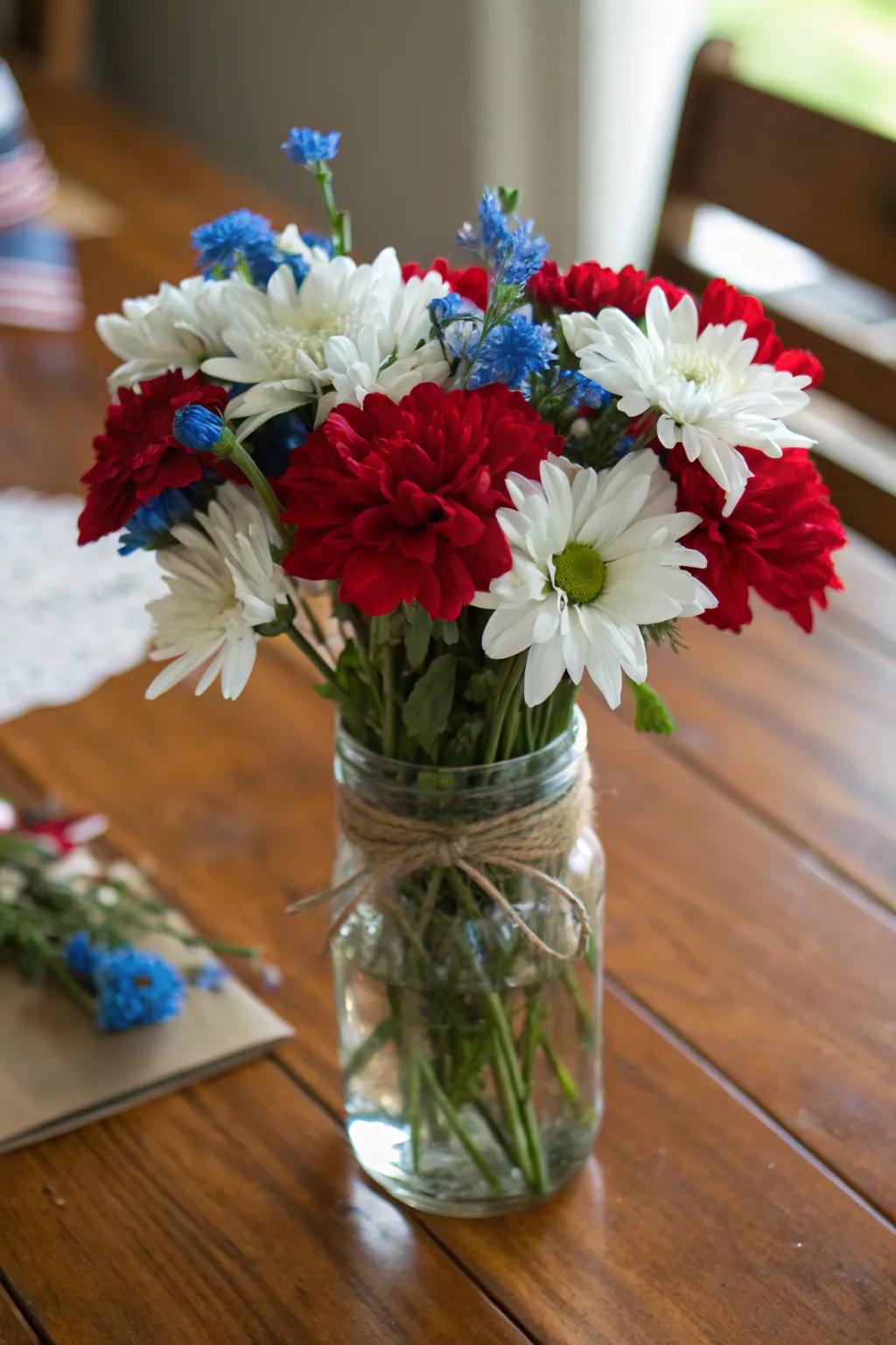 Patriotic flowers arranged simply in mason jars.