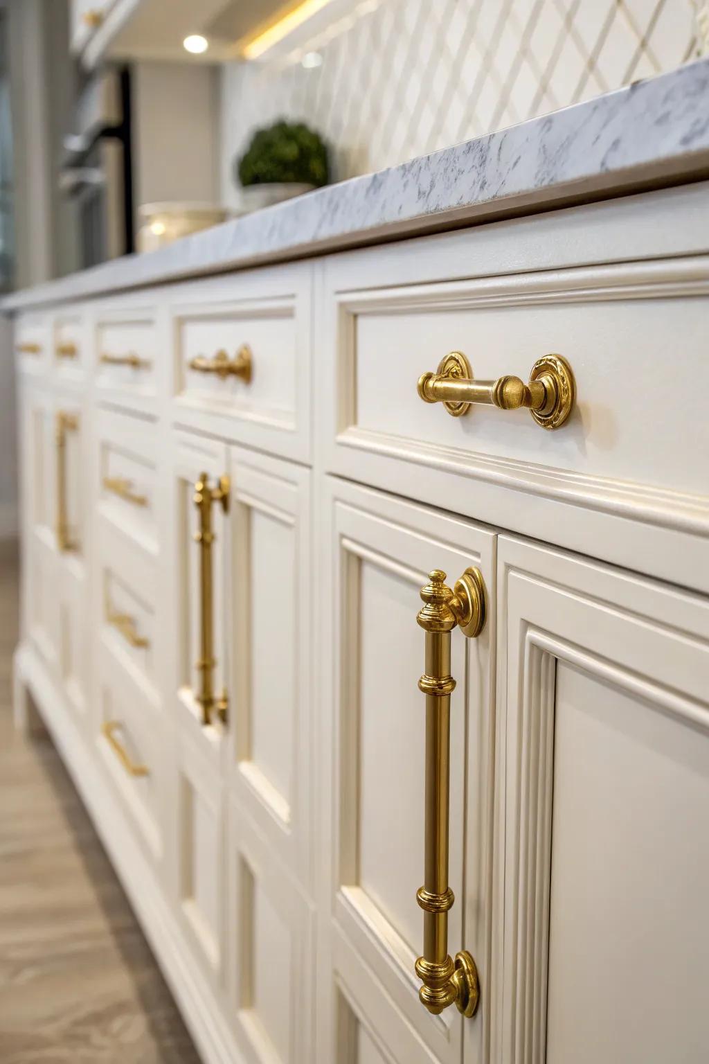 Gold hardware adds a hint of sophistication and stands out against white cabinets.