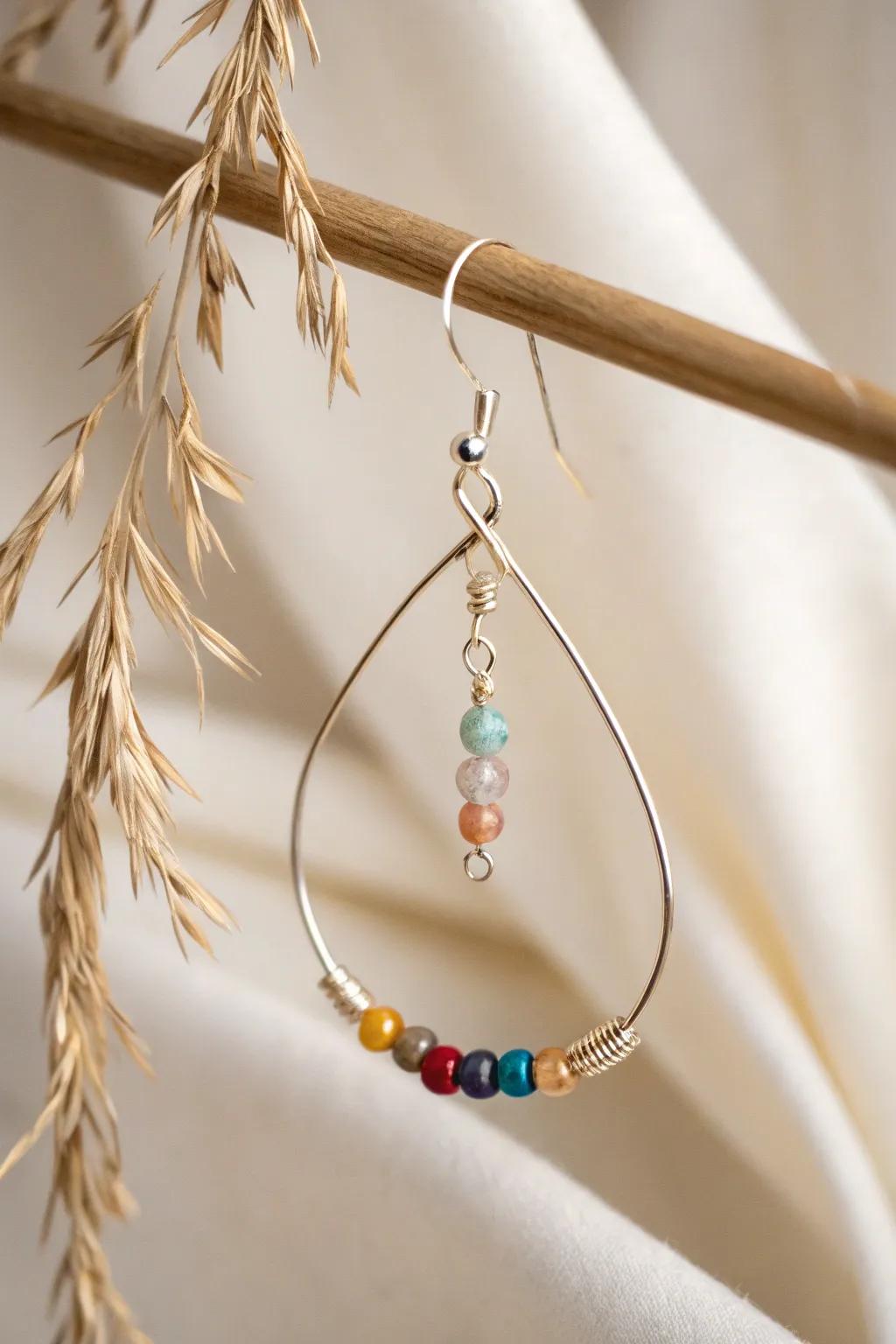 Enhance your personal style with bespoke gemstone drop earrings&mdash;blending simplicity with vibrant sophistication.