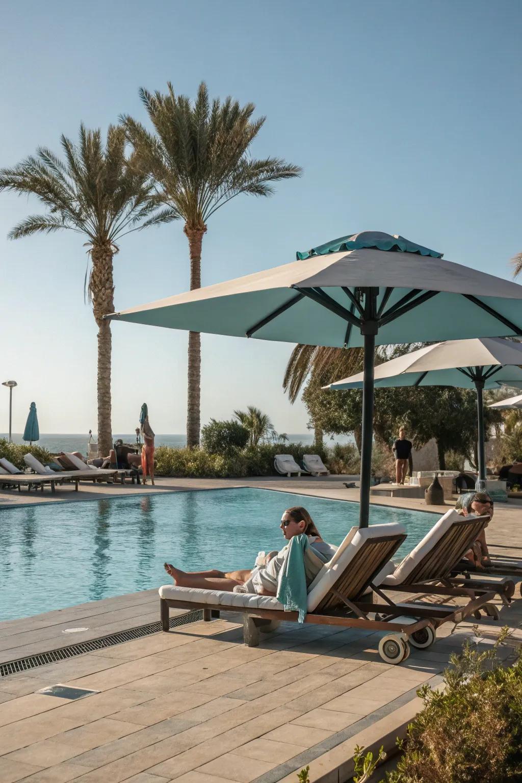 A refreshing poolside oasis with umbrella shade.