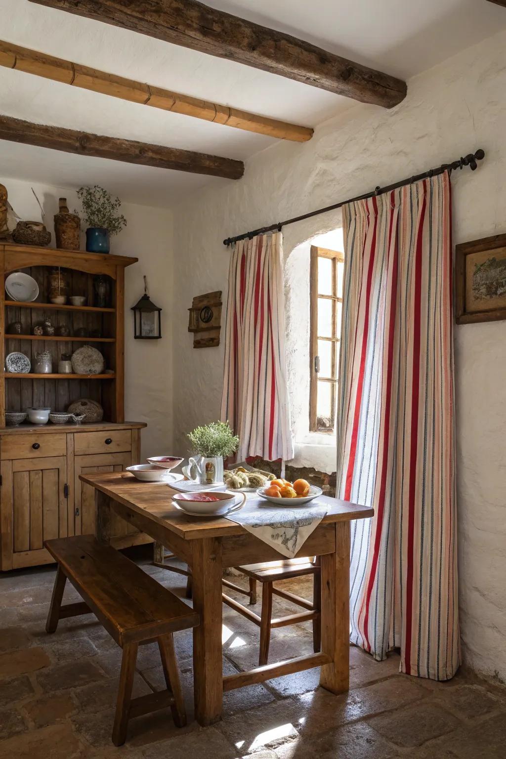 Striped curtains adding charm to a rustic farmhouse dining area.