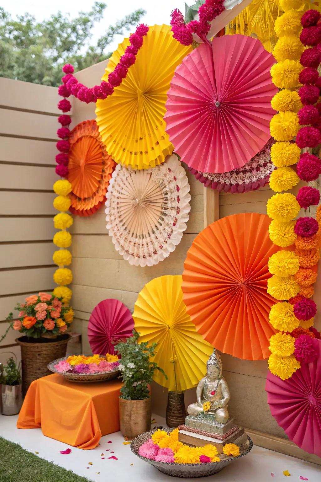 A dynamic setting of paper blossoms and folding fans, adding a playful element to the Ganesh Chaturthi festivities.