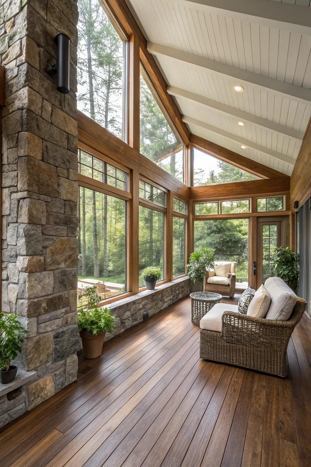 Natural wood and stone infuse an earthy charm into a modern sunroom.