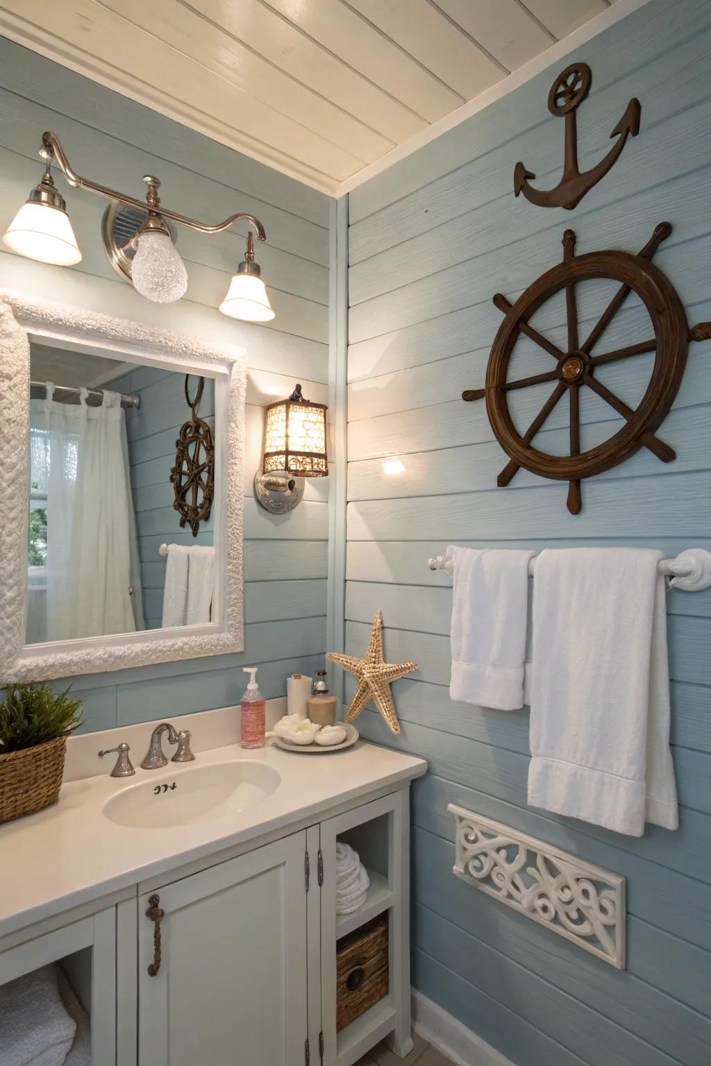 A bathroom featuring soft blue wall plank walls and maritime decor.