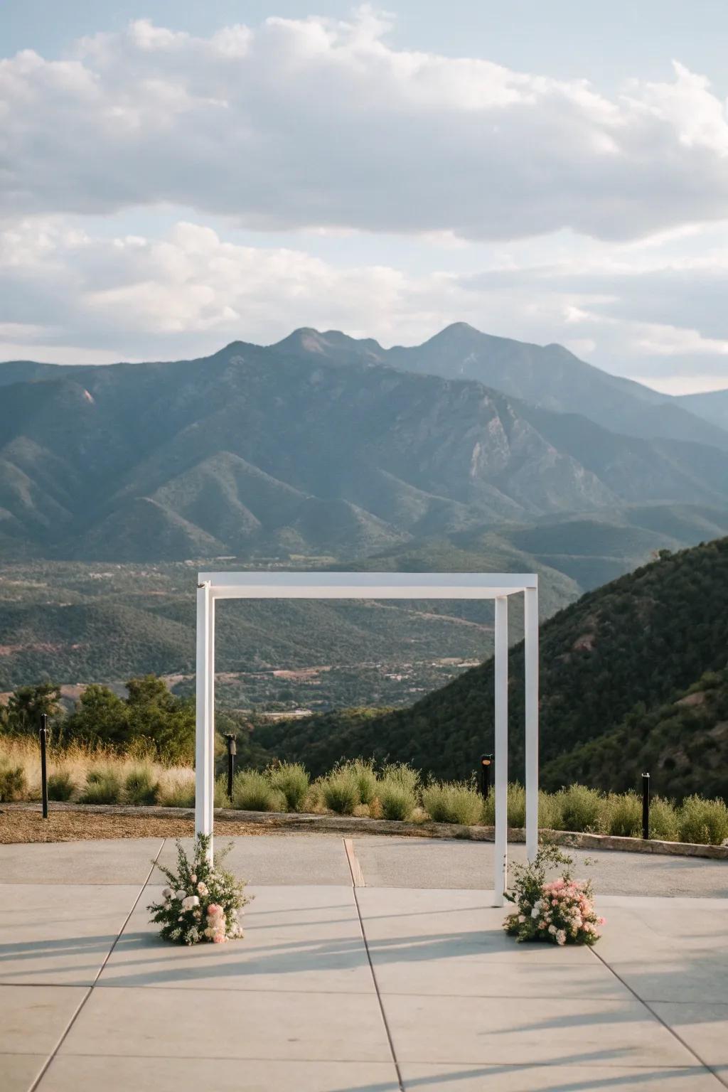 A minimalist square arch accentuating a spectacular mountain vista.