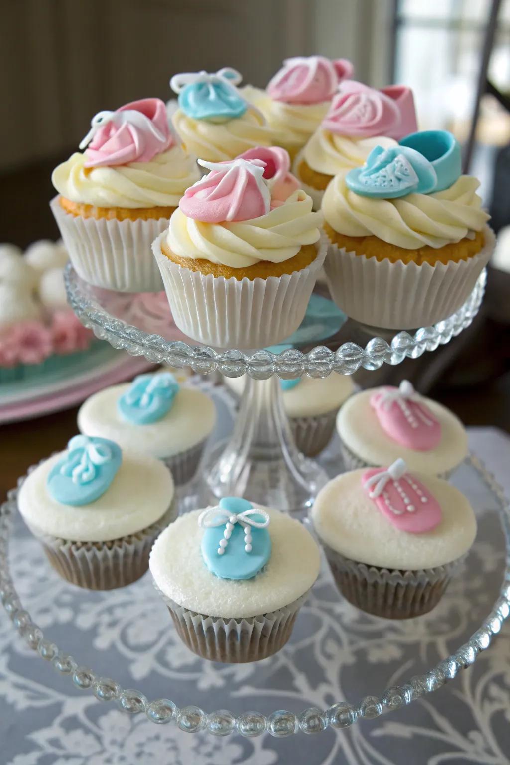 Delightful baby bootie-topped cupcakes contribute a whimsical flair.