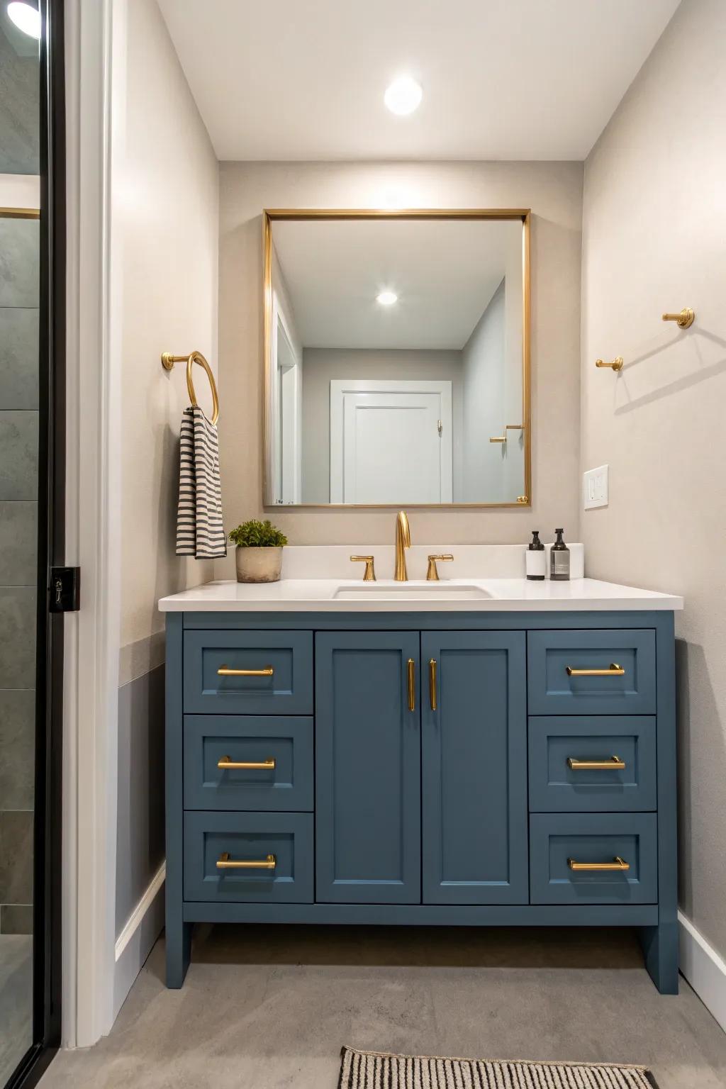 Iron blue and gold hardware coalesce to craft a polished contemporary mood.