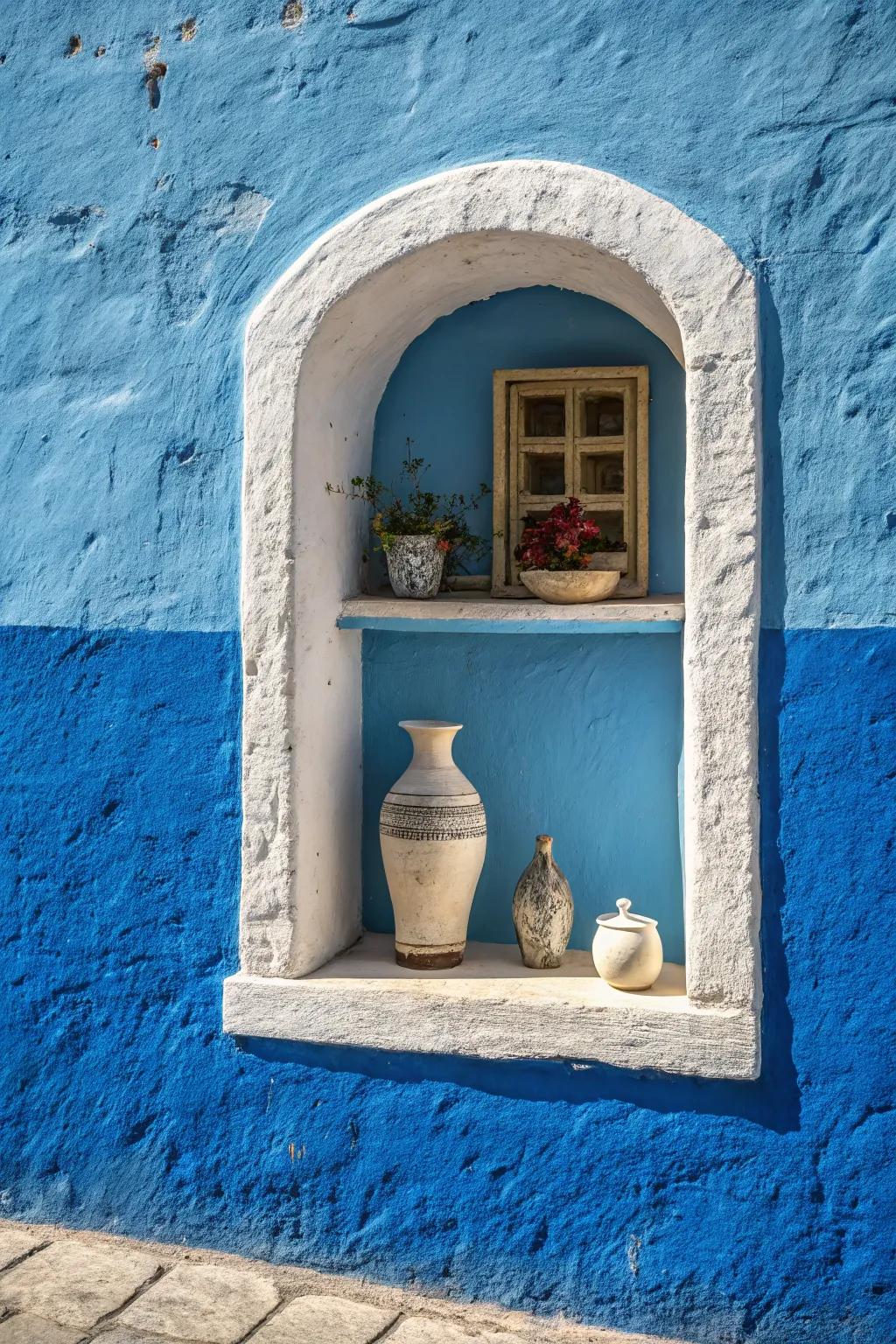A wall niche painted in a contrasting teal color, crafting a dramatic point of focus.