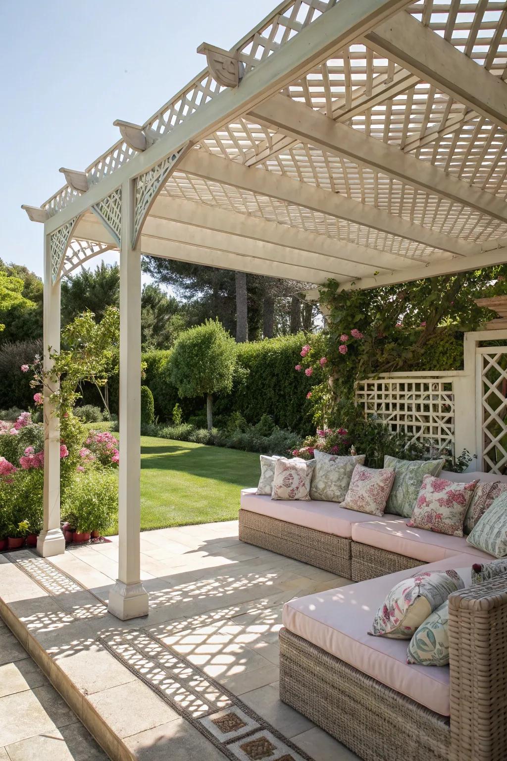 An openwork-roofed garden frame provides chic shade and a snug outdoor chamber feel.