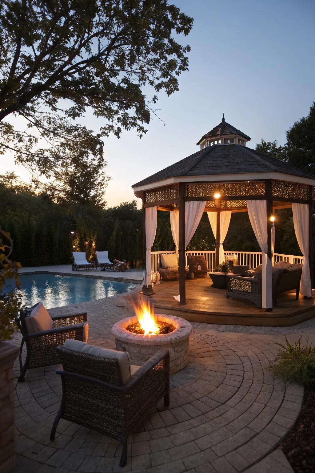 A fire pit enhances the gazebo&rsquo;s warmth and night time charm.