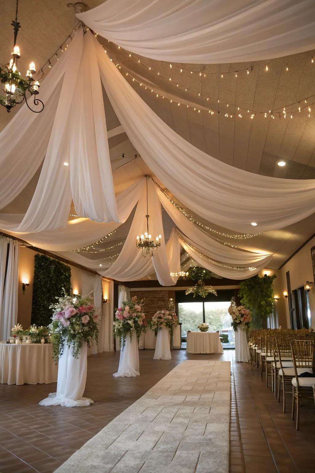 A heartfelt wedding venue featuring flowing material on the ceiling.