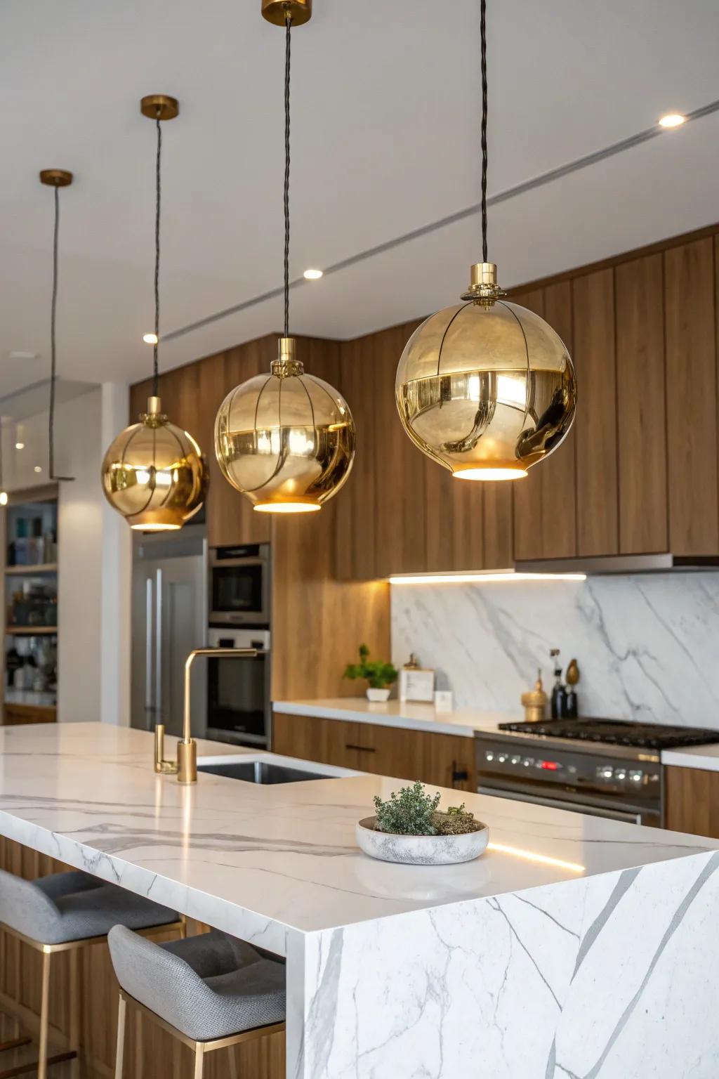 Gold lighting fixtures make your kitchen feel warmer and more focused.
