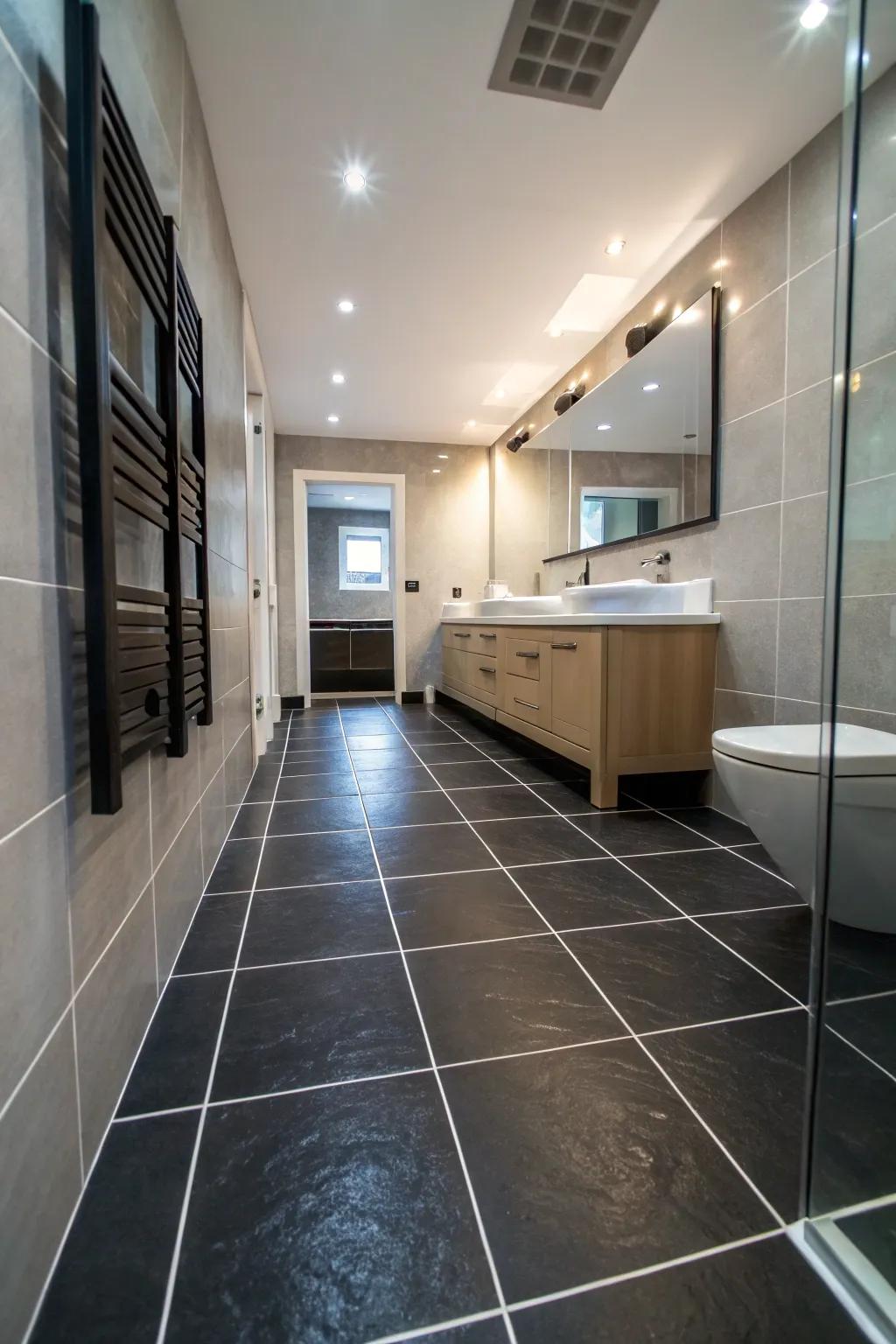 Large dark coverings create a seamless and spacious look in this bathroom.