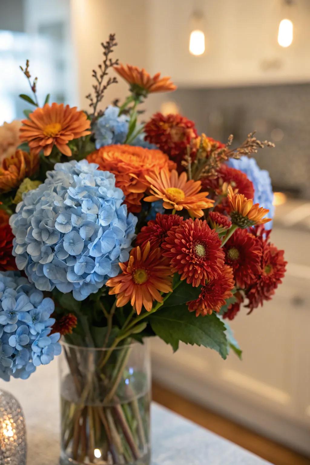 A distinctive floral arrangement featuring blue and autumnal elements.