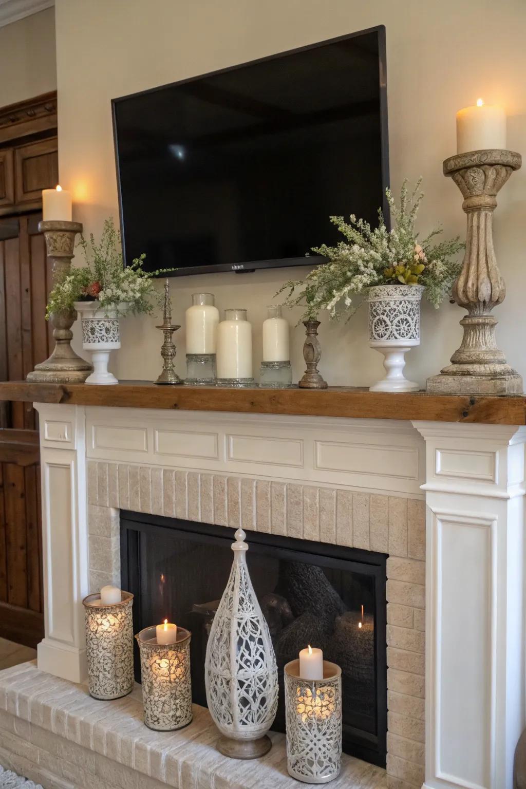 Farmhouse mantel beneath a TV, improved with fashionable glassware and candlelight.