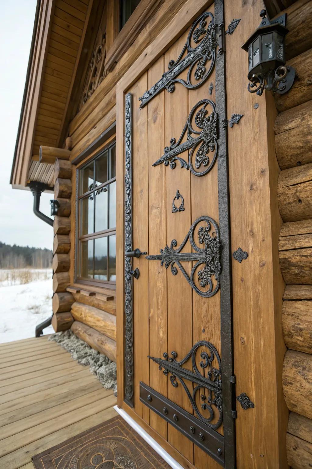 Decorative wrought iron hardware on a log cabin doorway.