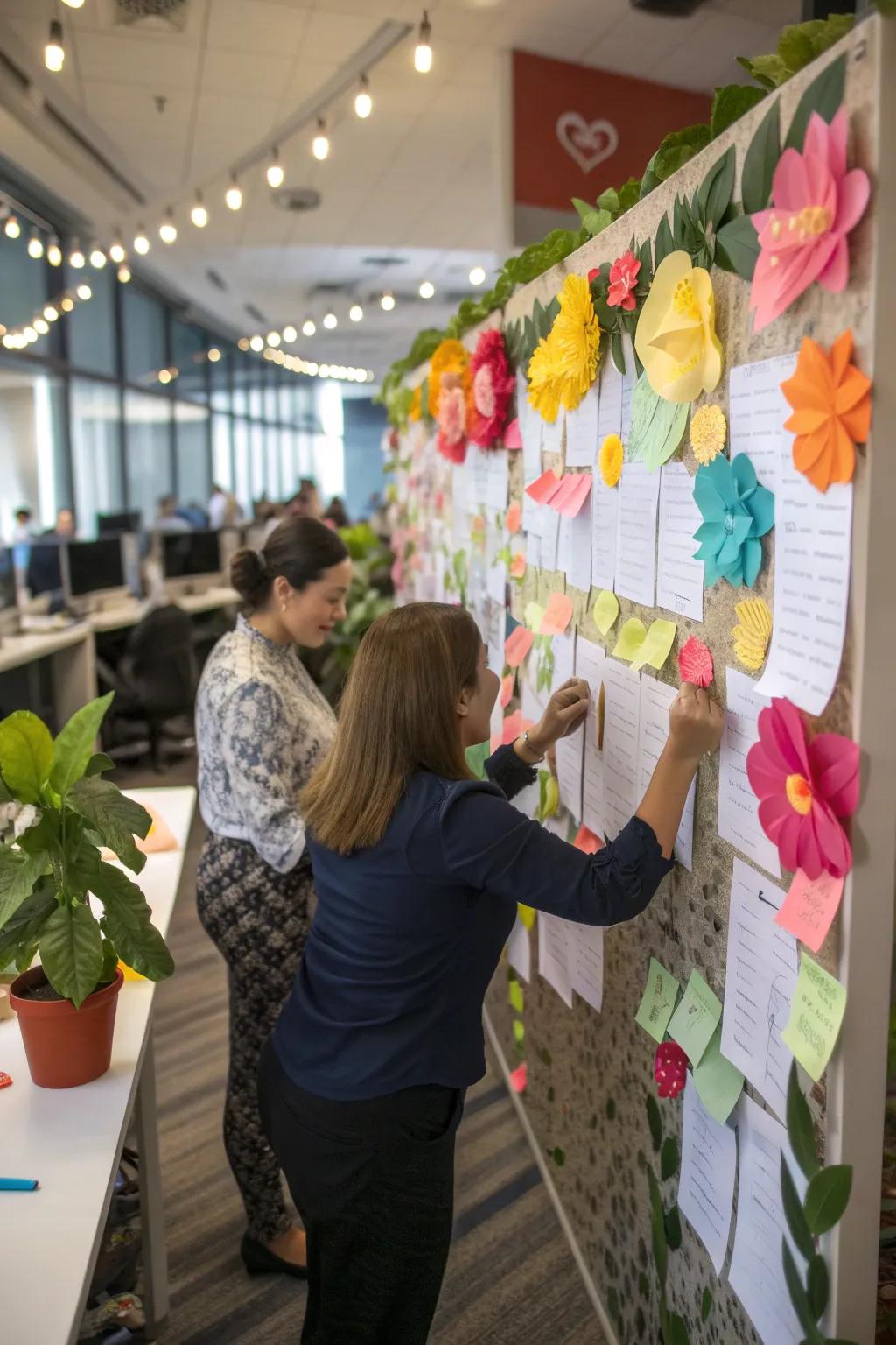 An interactive office bulletin board featuring floral cutouts representing team goals.