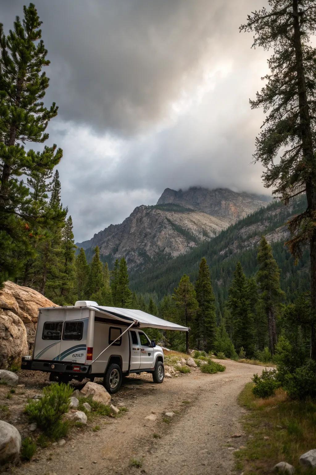 An adventurous setup featuring an awning in a rugged off-road setting.