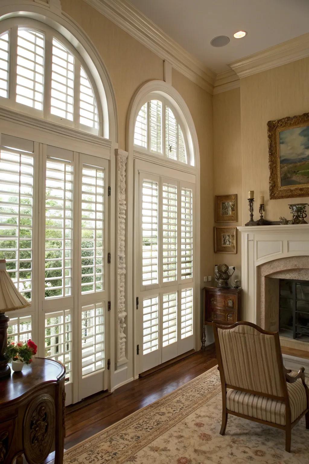 A classic room showcasing estate panels on arched windows.