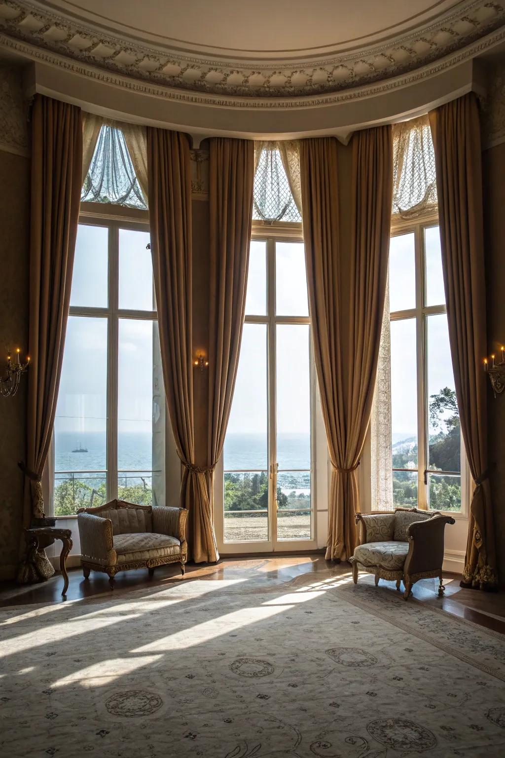 Floor-to-ceiling curtains introduce drama and sophistication.