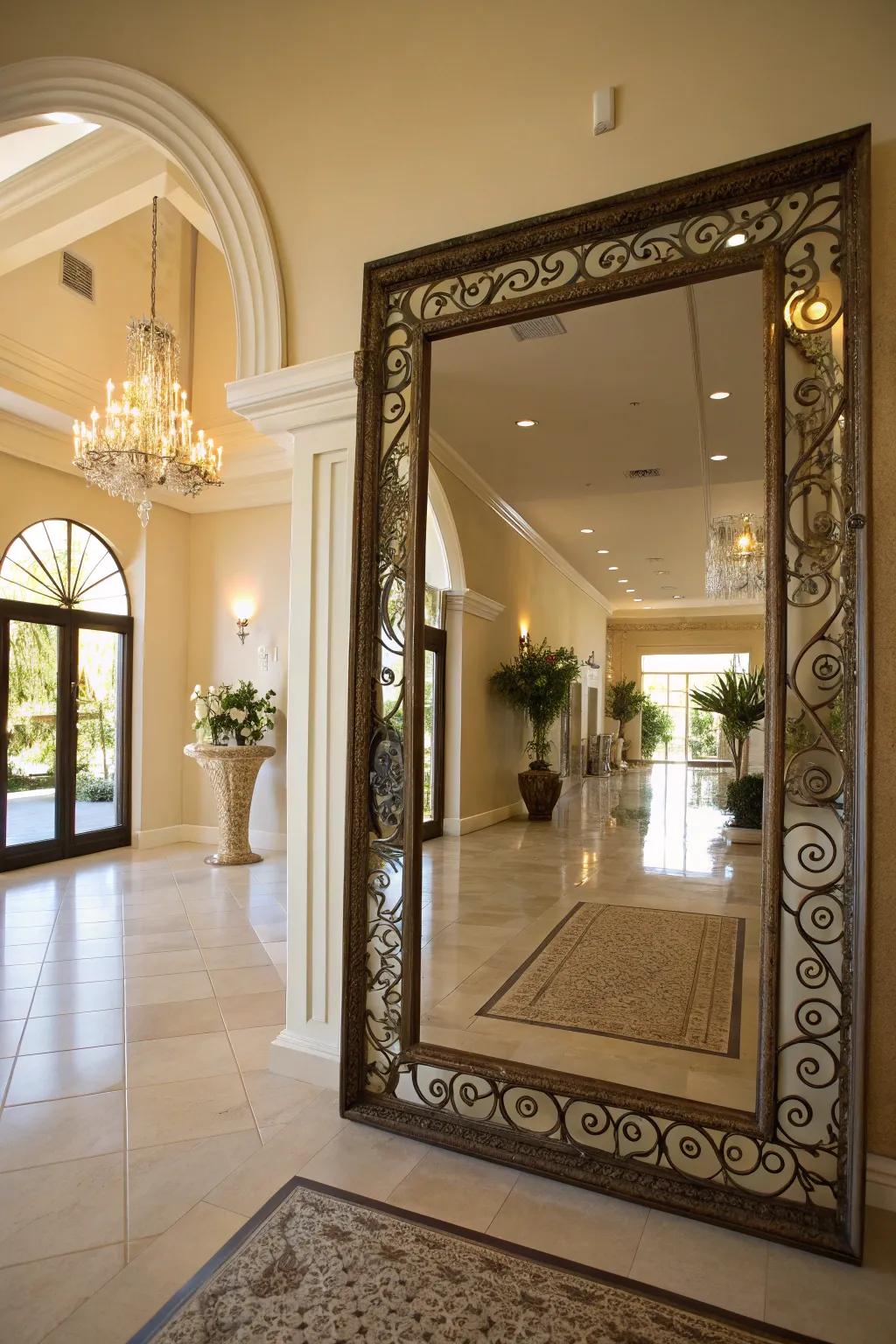 An entryway featuring a large decorative mirror that enhances light and spaciousness.