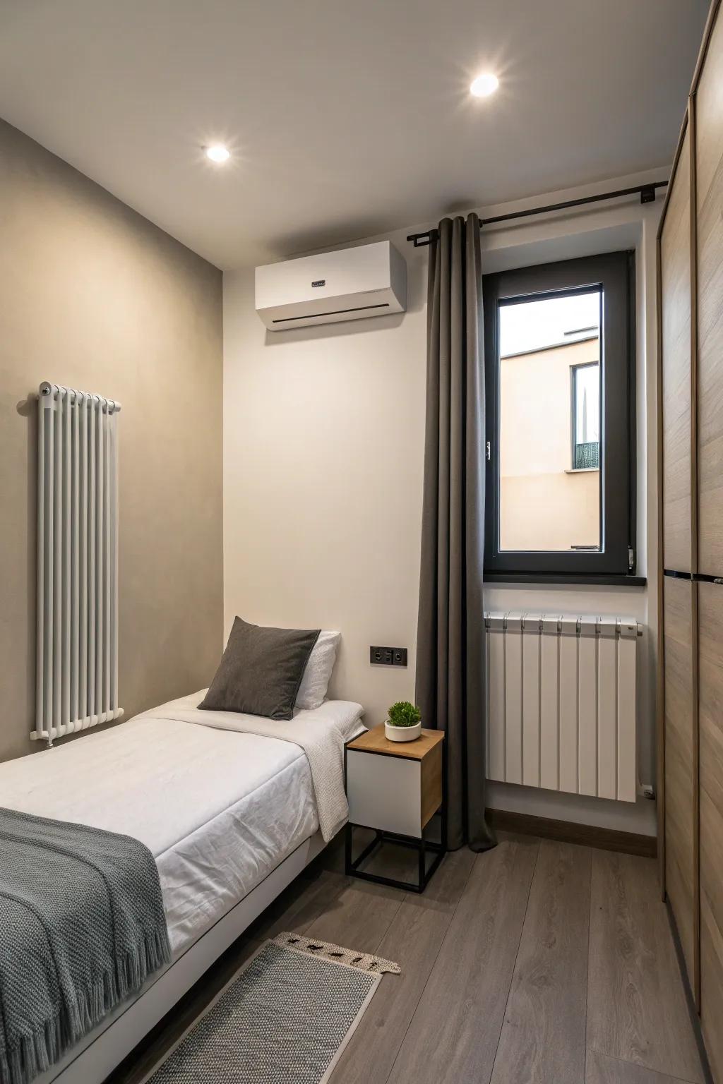 A small, modern bedroom with a sleek, wall-attached heater for effective space heating.