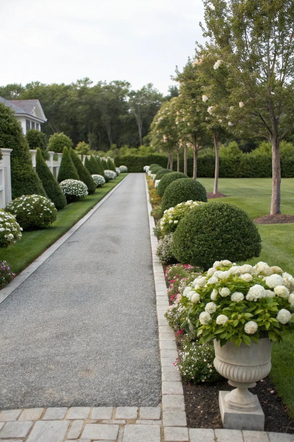 Landscaping with symmetry brings a sense of harmony to this driveway.